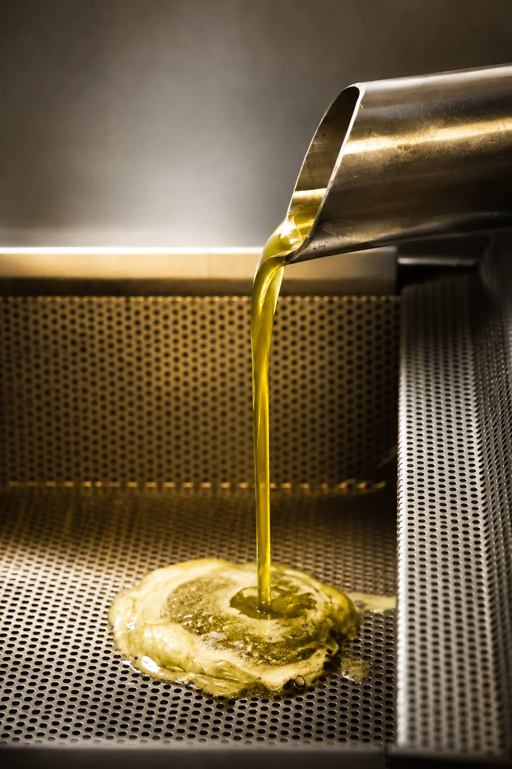 The first oil of the day coming off the press