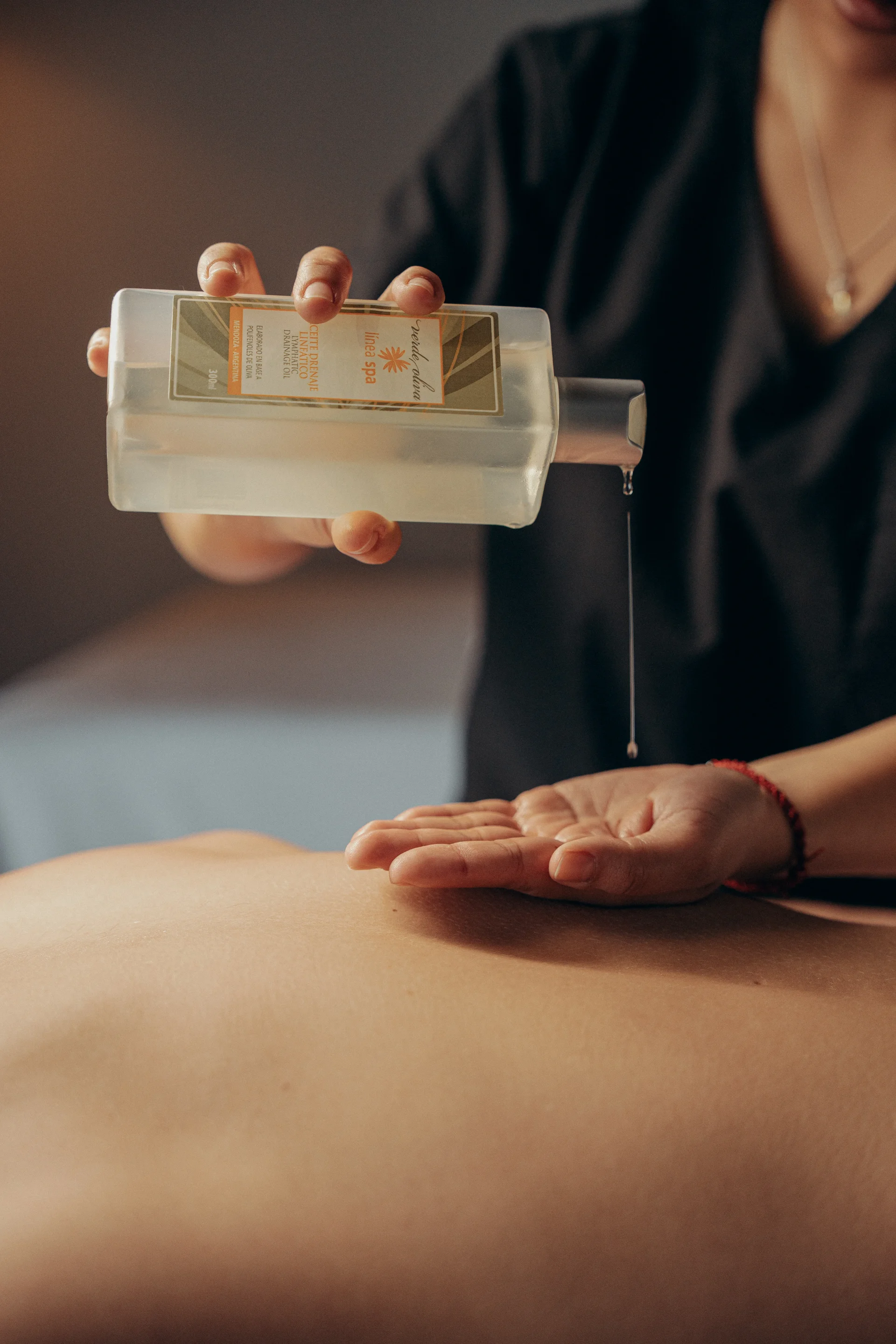Lymphatic drainage massage with olive-therapy cosmetics
