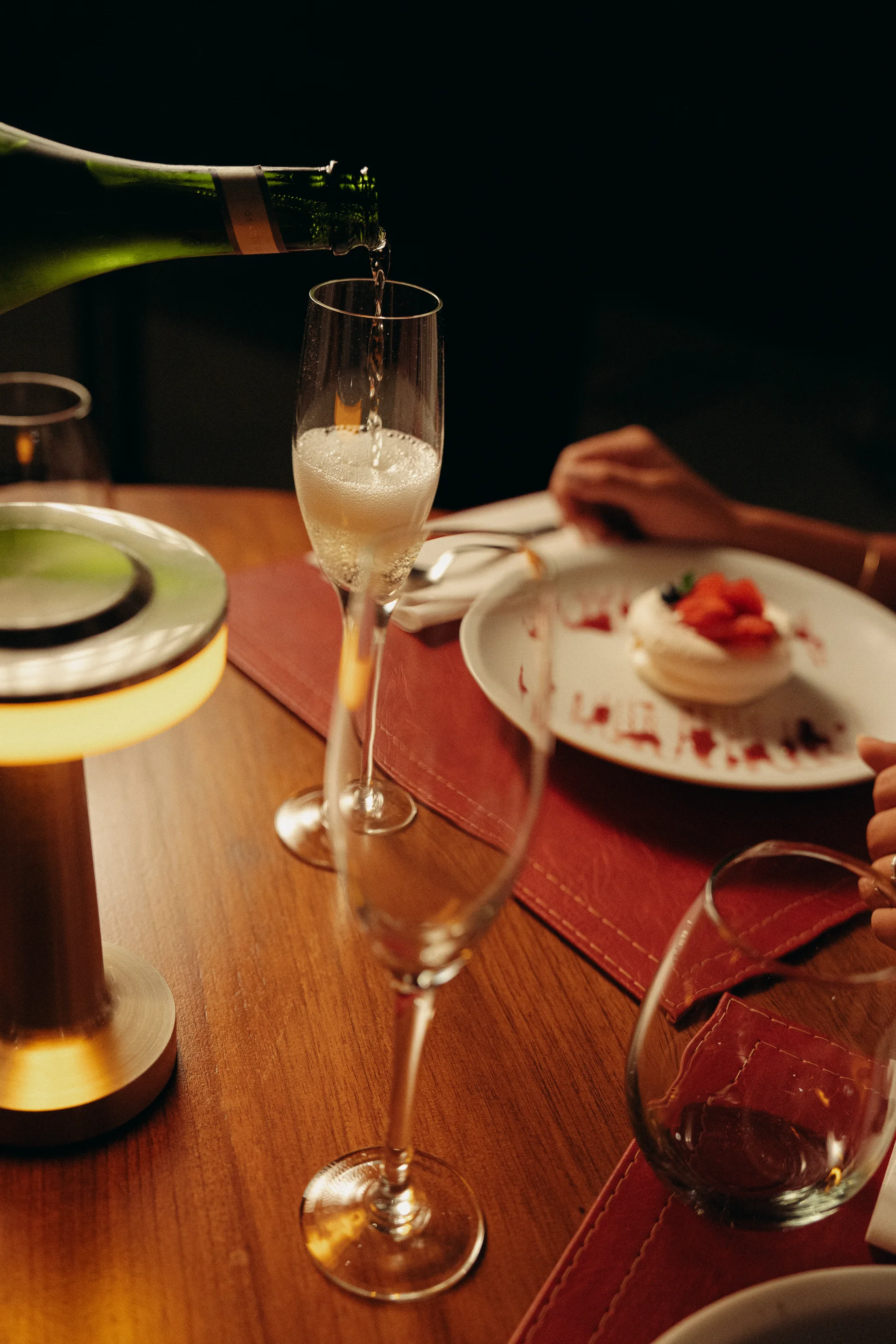 Champagne poured at the table